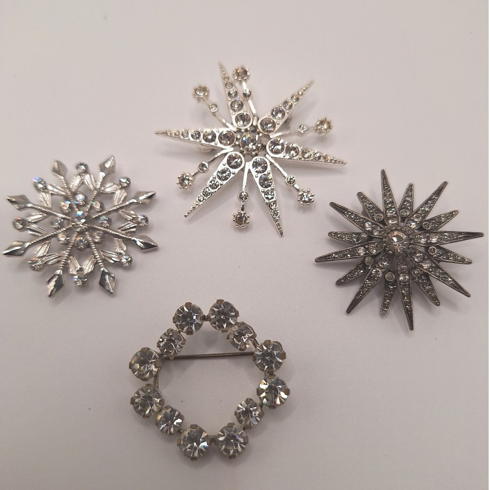 Vintage holiday brooches seasonal wreath snowflake starbursts rhinestones tone
